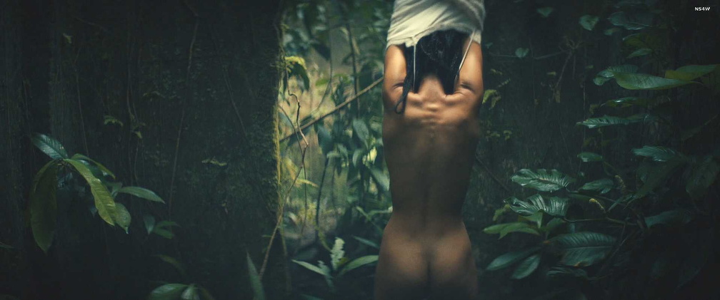Clark Backo removes clothes in the jungle exposing naked body