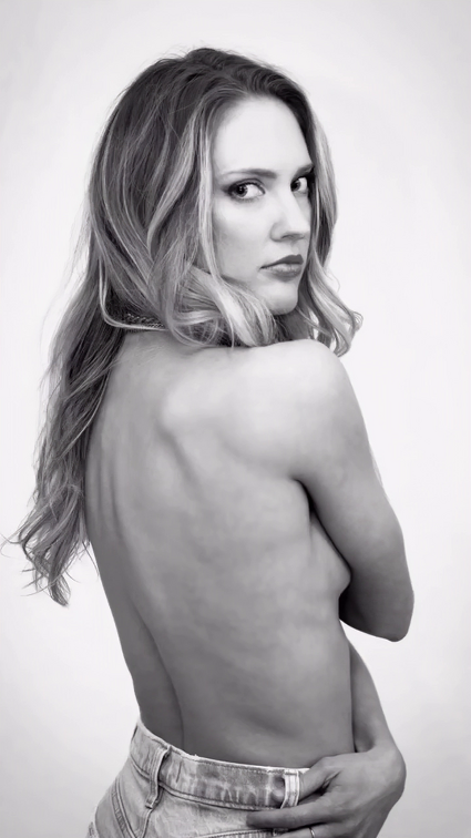 Ciara Hanna topless shot covering boobs