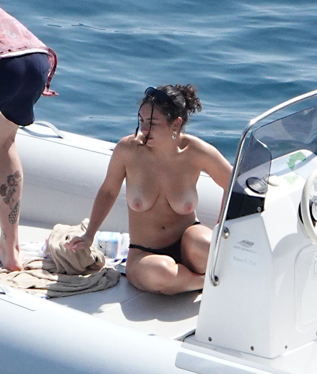 Charli XCX topless photo on a boat showing boobs