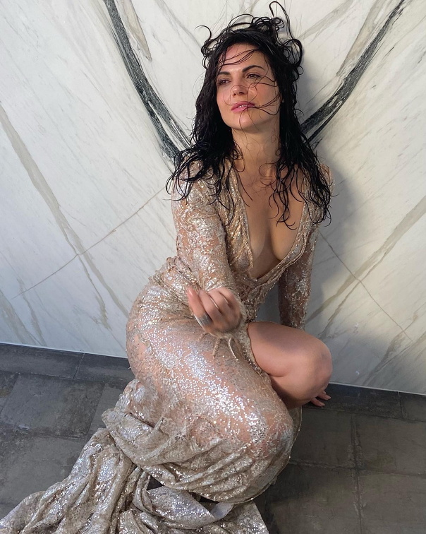 Lana Parrilla shows her cleavage in a fancy dress