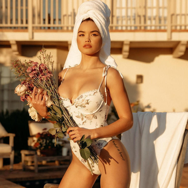 Paris Berelc shows huge melons in a tight swimsuit